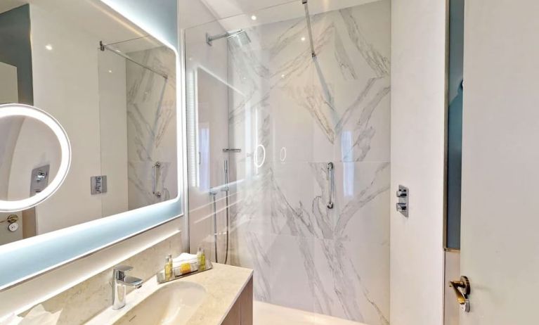 Guest bathroom with shower at DoubleTree By Hilton London Angel Kings Cross.