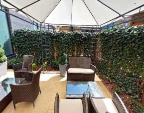 Outdoor patio perfect for coworking at DoubleTree By Hilton London Angel Kings Cross. 