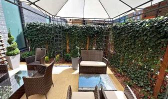 Outdoor patio perfect for coworking at DoubleTree By Hilton London Angel Kings Cross. 