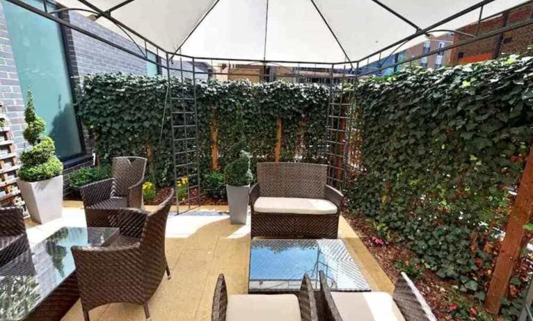 Outdoor patio perfect for coworking at DoubleTree By Hilton London Angel Kings Cross. 