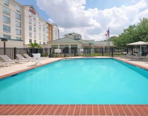 Refreshing outdoor pool at Hilton Garden Inn IAH Houston.