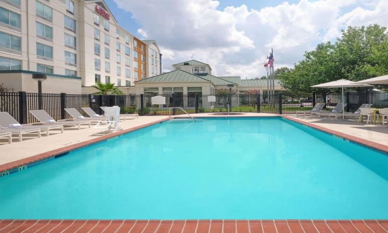 Refreshing outdoor pool at Hilton Garden Inn IAH Houston.