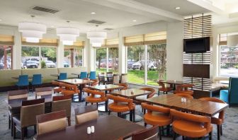 Dining area at Hilton Garden Inn IAH Houston.