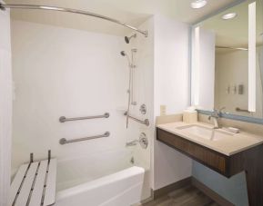 Guest bathroom with shower at Hilton Garden Inn IAH Houston.