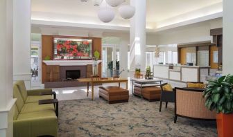 Lobby and coworking lounge at Hilton Garden Inn IAH Houston.