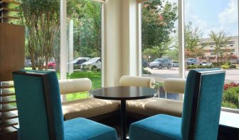 Lobby and coworking lounge at Hilton Garden Inn IAH Houston.