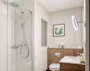 Guest bathroom with shower at DoubleTree By Hilton London - Chelsea.