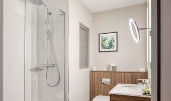 Guest bathroom with shower at DoubleTree By Hilton London - Chelsea.