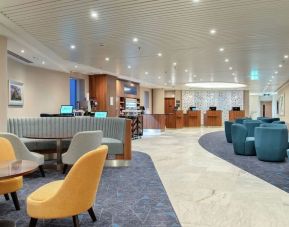 Lobby and coworking lounge at Hilton Garden Inn London Heathrow Terminals 2 And 3.