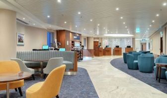 Lobby and coworking lounge at Hilton Garden Inn London Heathrow Terminals 2 And 3.