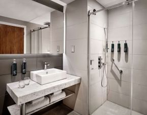 Guest bathroom with shower at DoubleTree By Hilton Lincoln.