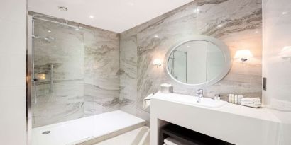 Guest bathroom with shower at DoubleTree By Hilton Edinburgh City Centre.