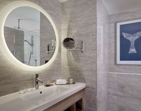 Guest bathroom with shower at DoubleTree By Hilton Hull.