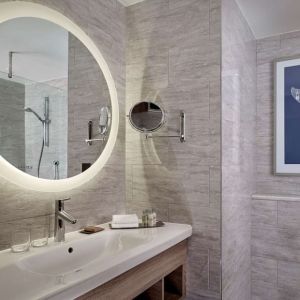 Guest bathroom with shower at DoubleTree By Hilton Hull.