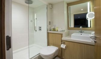 Guest bathroom with shower at DoubleTree By Hilton Coventry Building Society Arena.