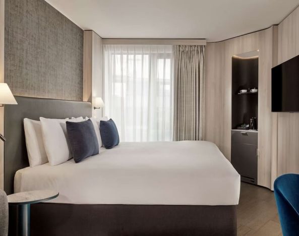 Elegant day room with natural light at The Westminster London, Curio Collection By Hilton.  