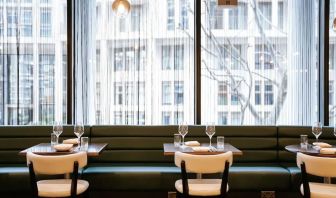 Hotel bar seating with natural light at The Westminster London, Curio Collection By Hilton.  