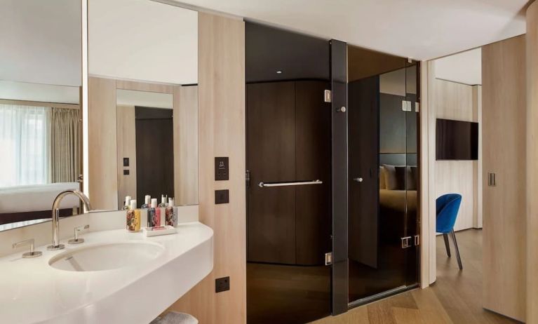 Guest bathroom with shower at The Westminster London, Curio Collection By Hilton.
