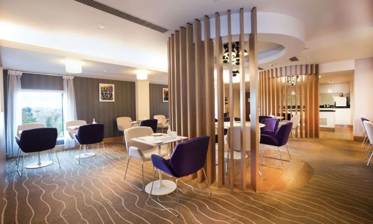 Lobby and coworking lounge at Hilton London Heathrow Airport Terminal 5.