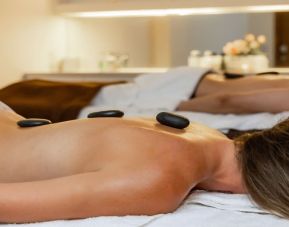 Hot stone massage available at Hilton London Heathrow Airport Terminal 5.