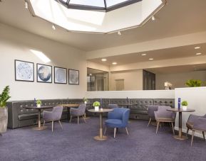 Lobby and coworking lounge at DoubleTree By Hilton Manchester Airport.