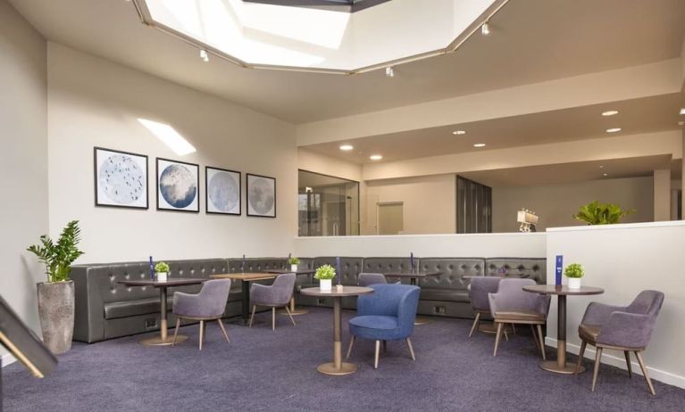 Lobby and coworking lounge at DoubleTree By Hilton Manchester Airport.