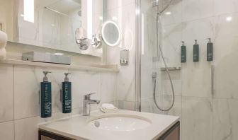 Guest bathroom with shower at DoubleTree By Hilton Manchester Airport.