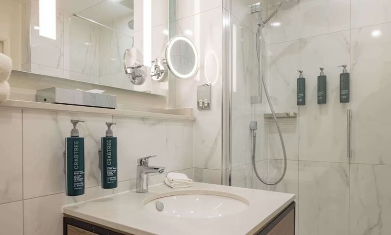 Guest bathroom with shower at DoubleTree By Hilton Manchester Airport.