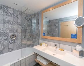 Guest bathroom with shower at Hilton Bournemouth.  