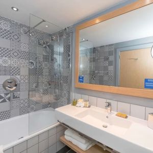 Guest bathroom with shower at Hilton Bournemouth.  