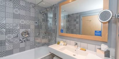 Guest bathroom with shower at Hilton Bournemouth.  