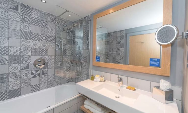 Guest bathroom with shower at Hilton Bournemouth.  