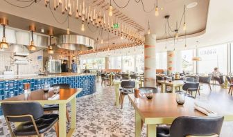 Dining area with natural light at Hilton Bournemouth.  