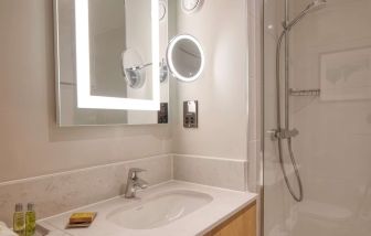 Guest bathroom with shower at DoubleTree By Hilton Southampton.