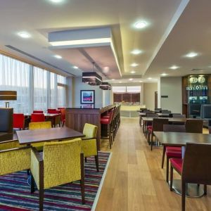 Dining area perfect for coworking at Hampton By Hilton London Luton Airport. 