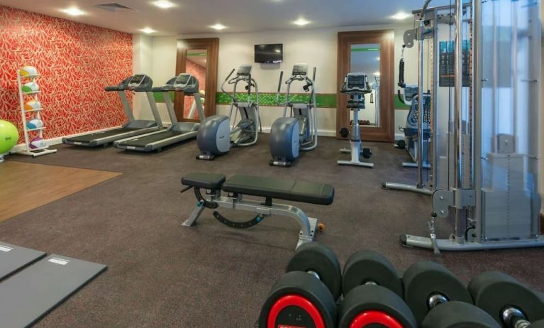 Fitness center available at Hampton By Hilton London Luton Airport.