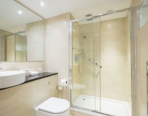 Guest bathroom with shower at DoubleTree By Hilton Hotel & Spa Chester.