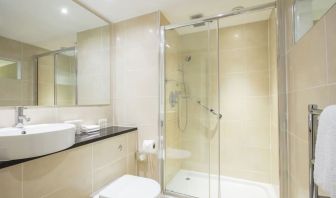 Guest bathroom with shower at DoubleTree By Hilton Hotel & Spa Chester.