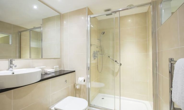 Guest bathroom with shower at DoubleTree By Hilton Hotel & Spa Chester.