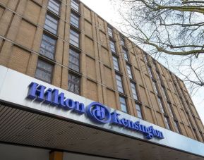 Hotel exterior at Hilton London Kensington.
