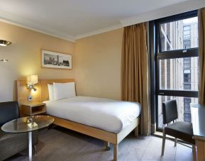 Day use room with furniture at Hilton London Kensington.
