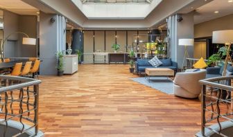 Lobby and coworking lounge at Hilton London Kensington.
