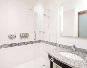 Guest bathroom with shower at Hampton By Hilton Sheffield.