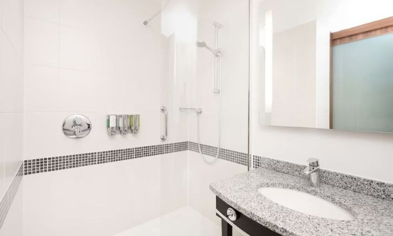 Guest bathroom with shower at Hampton By Hilton Sheffield.