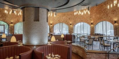 Industrial-chic dining area at DoubleTree By Hilton Bristol City Centre. 
