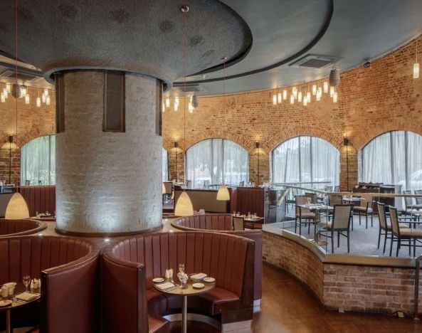 Industrial-chic dining area at DoubleTree By Hilton Bristol City Centre. 
