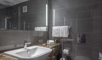 Guest bathroom with shower at DoubleTree By Hilton Bristol City Centre.  