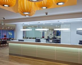 Hotel reception at Hampton By Hilton London Gatwick Airport.