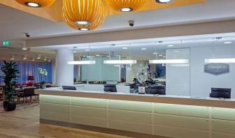 Hotel reception at Hampton By Hilton London Gatwick Airport.