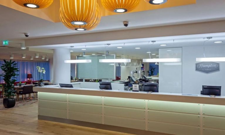 Hotel reception at Hampton By Hilton London Gatwick Airport.